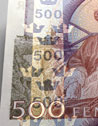 Bild på skimrande guldfärg på 500-kronorssedeln från 2001